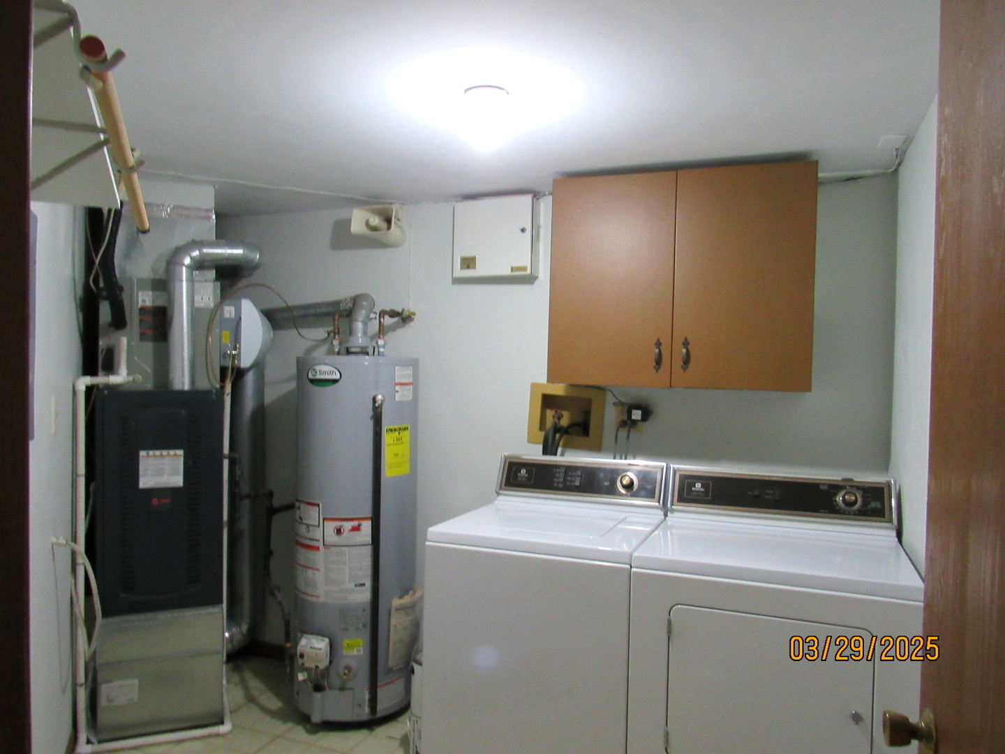 1735 Chesapeake Lane, Unit 7 Schaumburg, IL 60193 - Photo 10 of 22 a utility room with dryer and washer