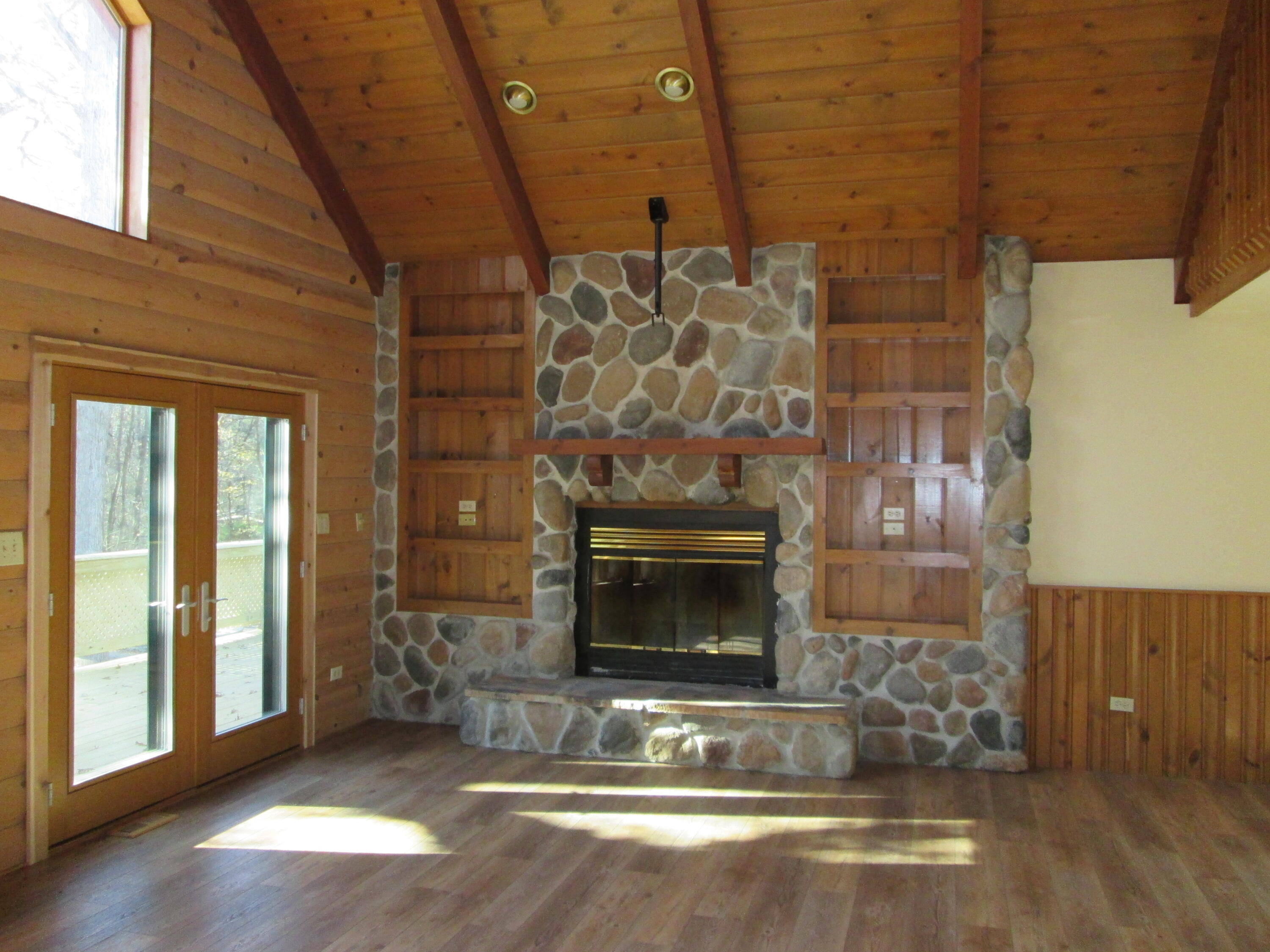 23900 Cline Avenue Lowell, IN 46356 - Photo 7 of 12 a living room with a fireplace
