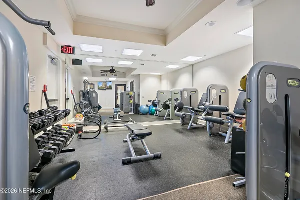 a kitchen with stainless steel appliances kitchen island granite countertop a sink and cabinets