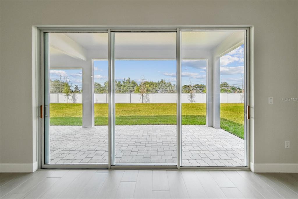 17019 Overstory Road Orlando, FL 32820 - Photo 12 of 85 a view of an empty room and window