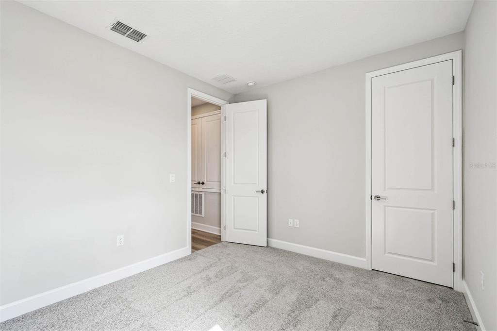 17019 Overstory Road Orlando, FL 32820 - Photo 17 of 85 a view of an empty room