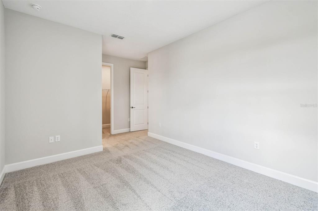 17019 Overstory Road Orlando, FL 32820 - Photo 44 of 85 a view of an empty room