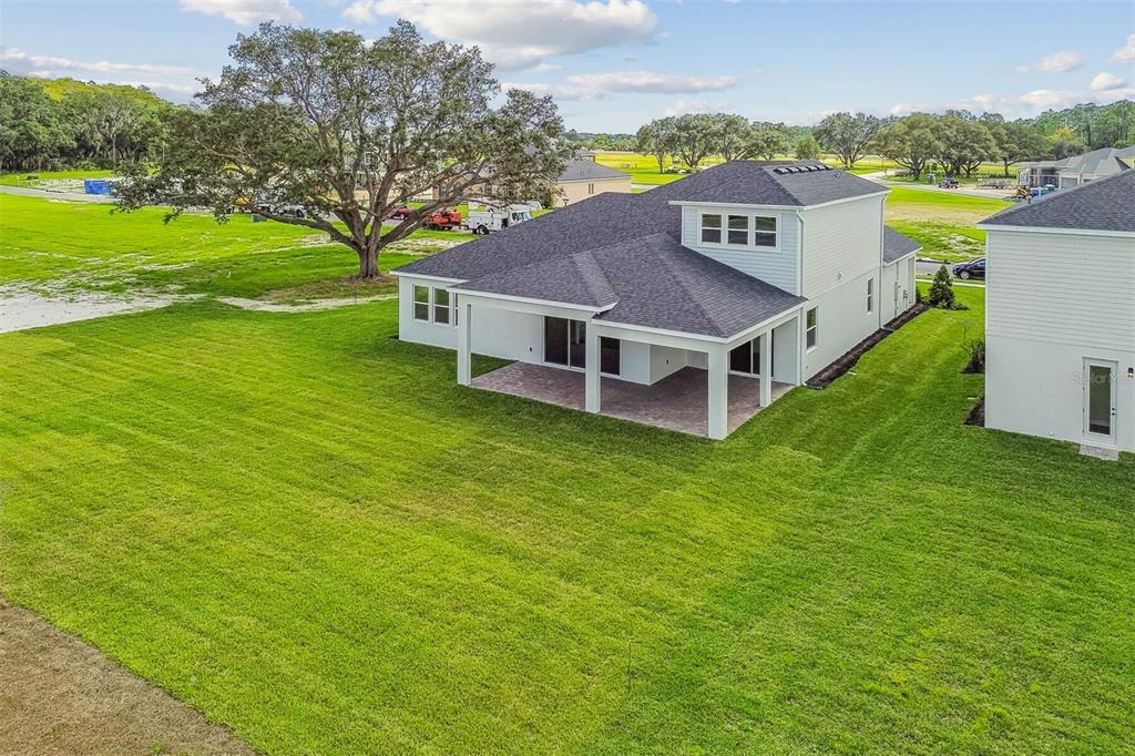 17019 Overstory Road Orlando, FL 32820 - Photo 69 of 85 a aerial view of a house with a big yard