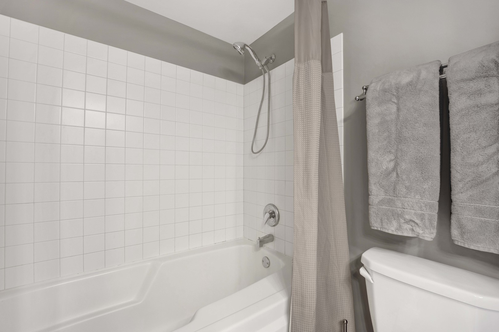 1632 South Indiana Avenue, Unit 409 Chicago, IL 60616 - Photo 13 of 21 a bathroom with a shower a toilet and a shower