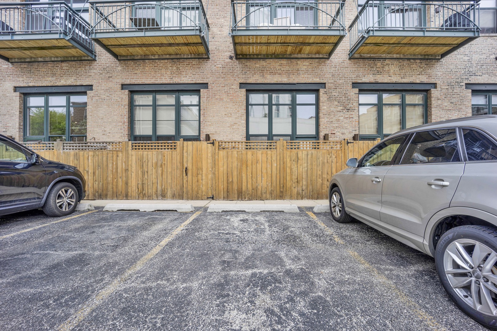 1632 South Indiana Avenue, Unit 409 Chicago, IL 60616 - Photo 21 of 21 a view of a car parked in front of a house