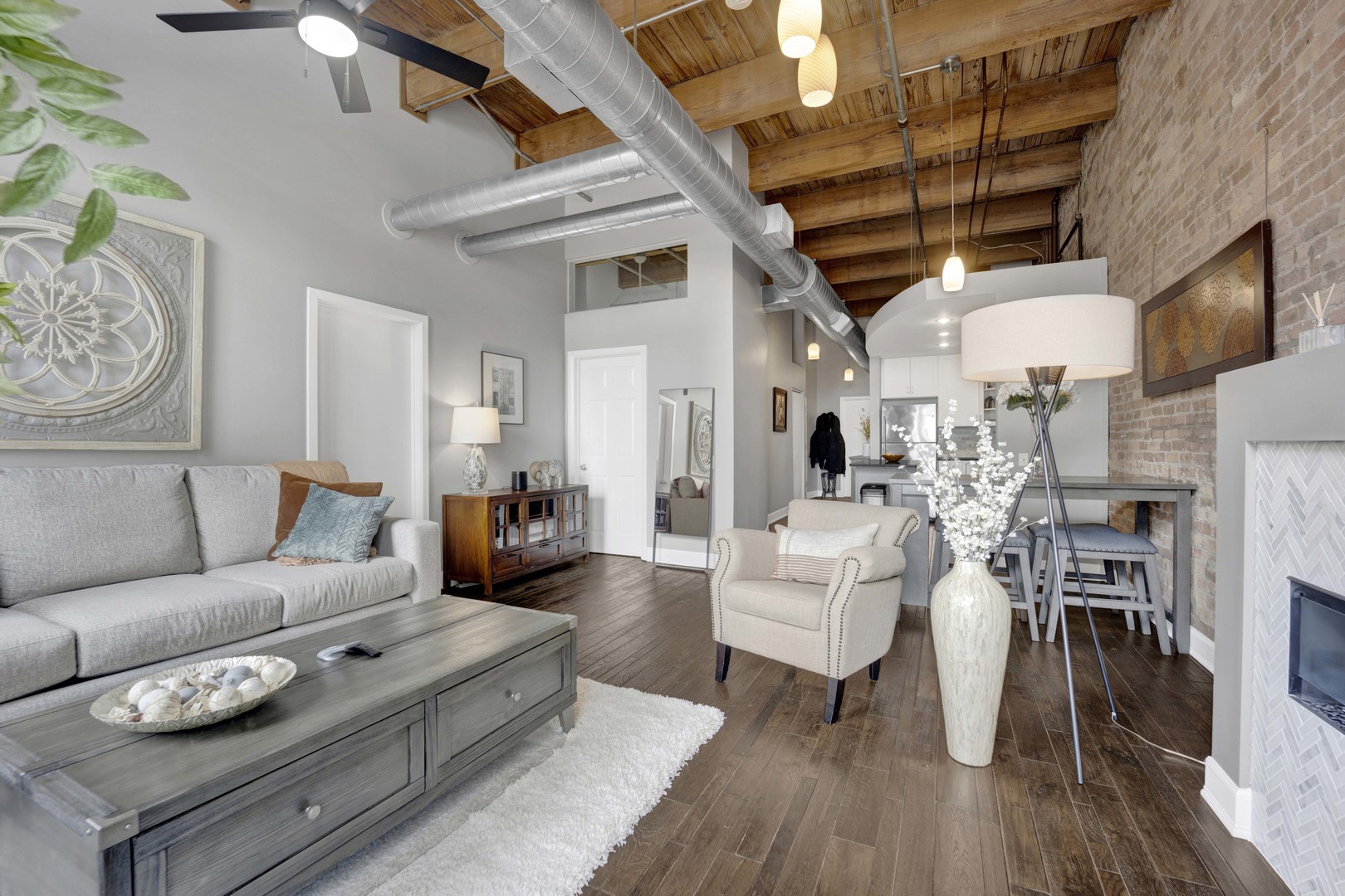 1632 South Indiana Avenue, Unit 409 Chicago, IL 60616 - Photo 5 of 21 a living room with furniture and a wooden floor