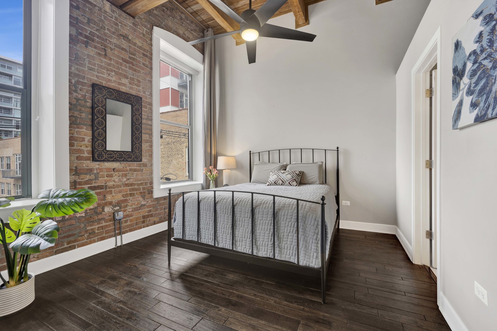 1632 South Indiana Avenue, Unit 409 Chicago, IL 60616 - Photo 10 of 21 a view of a bedroom with wooden floor