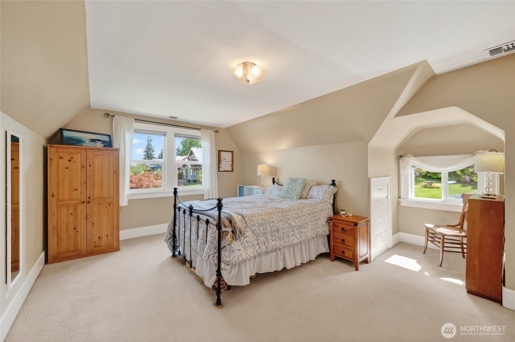 258 North Forest Street Bellingham, WA 98225 - Photo 27 of 40 a bed room with a bed and a chair