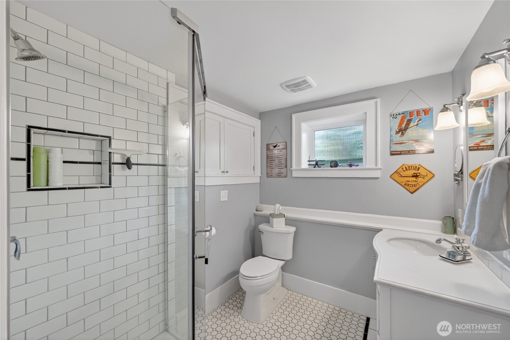 258 North Forest Street Bellingham, WA 98225 - Photo 32 of 40 a bathroom with a sink a toilet and shower