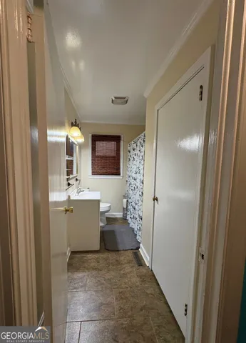 a bathroom with a sink a mirror and a bathtub