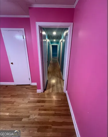 a view of a entryway with wooden floor