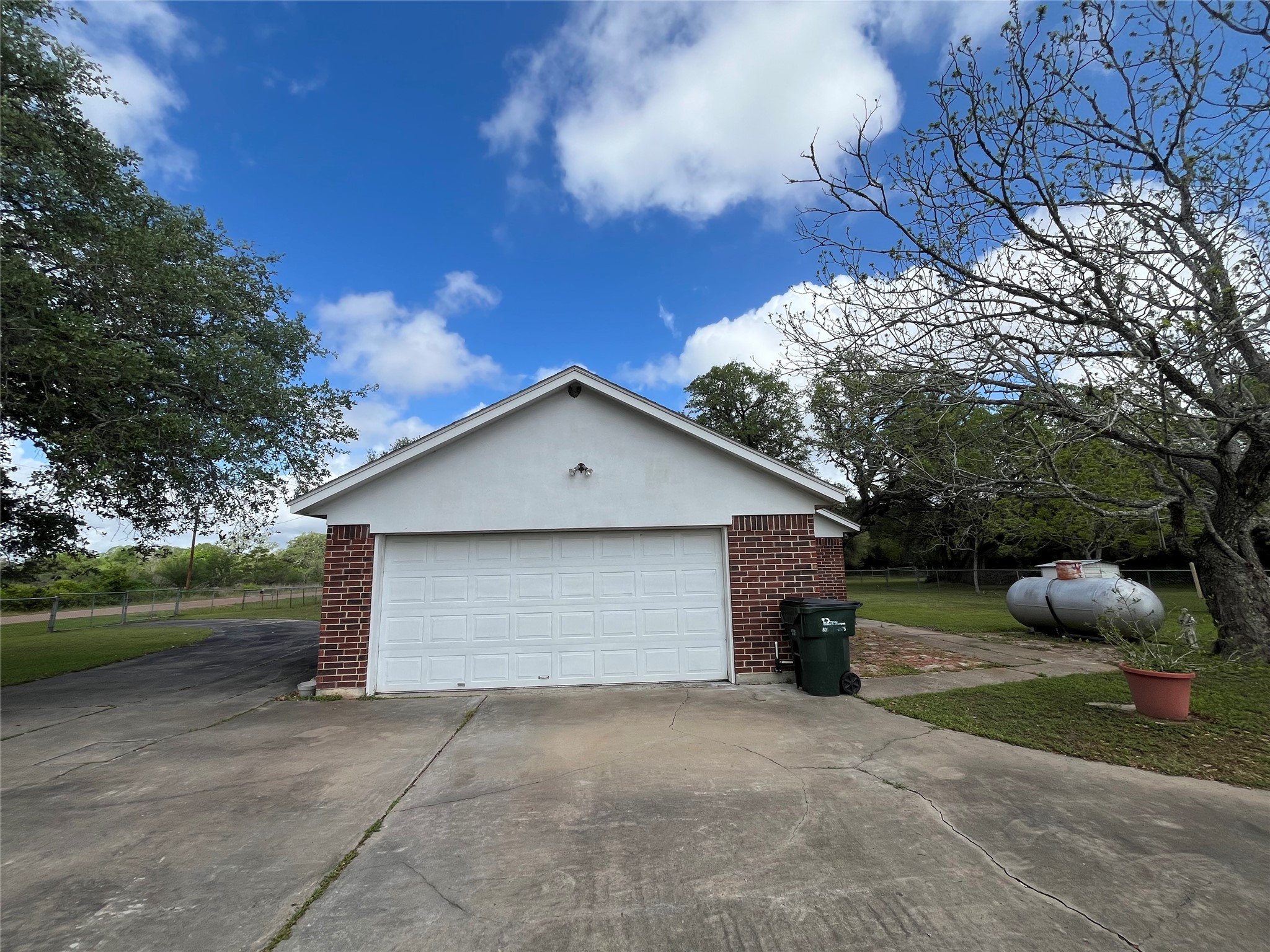 1475 Cr 16 Road Garwood, TX 77442 - Photo 35 of 43 a front view of a house with garden