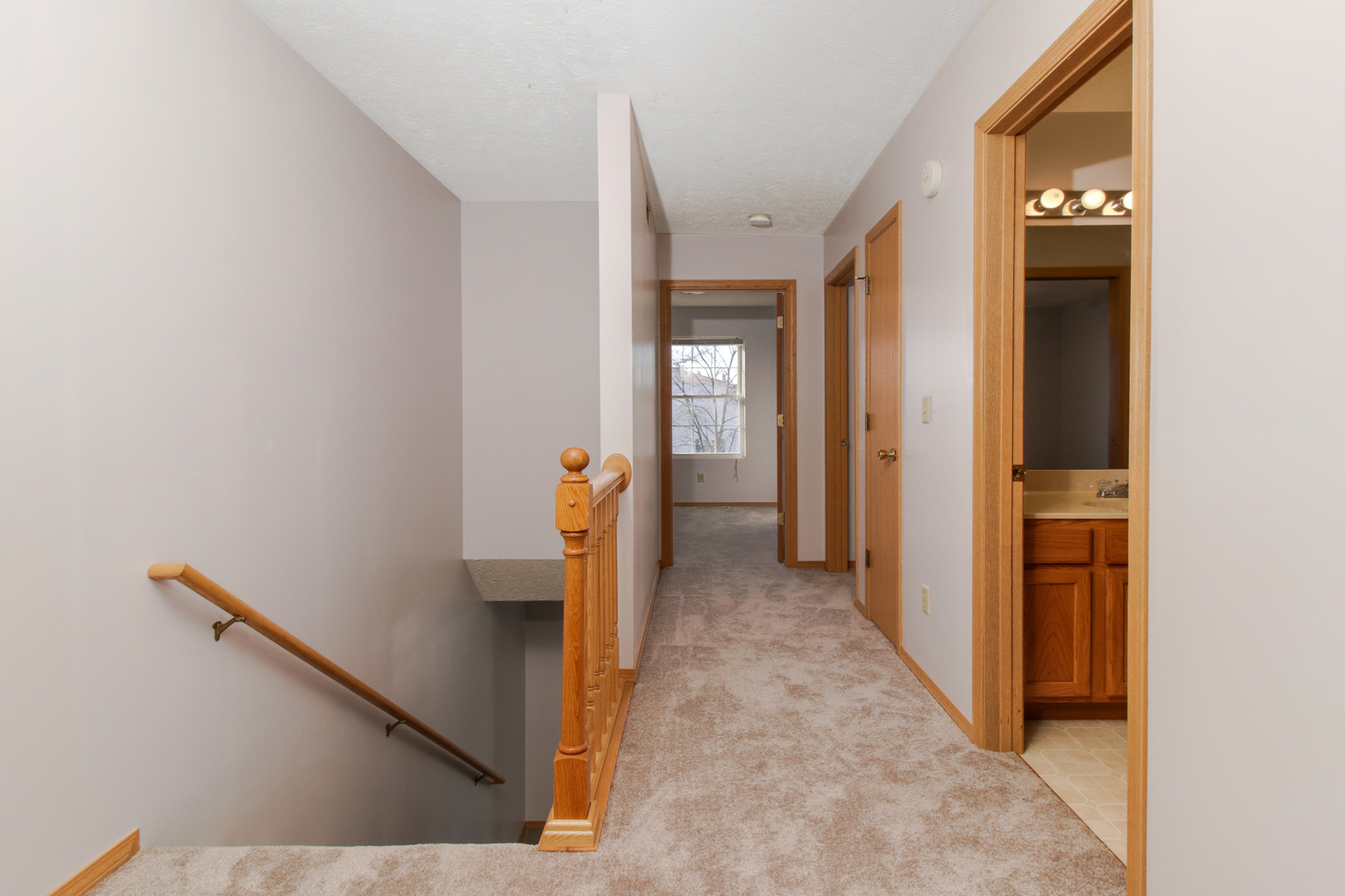 2 Andy Court, Unit 3 Bloomington, IL 61704 - Photo 11 of 28 a view of a hallway with hallway