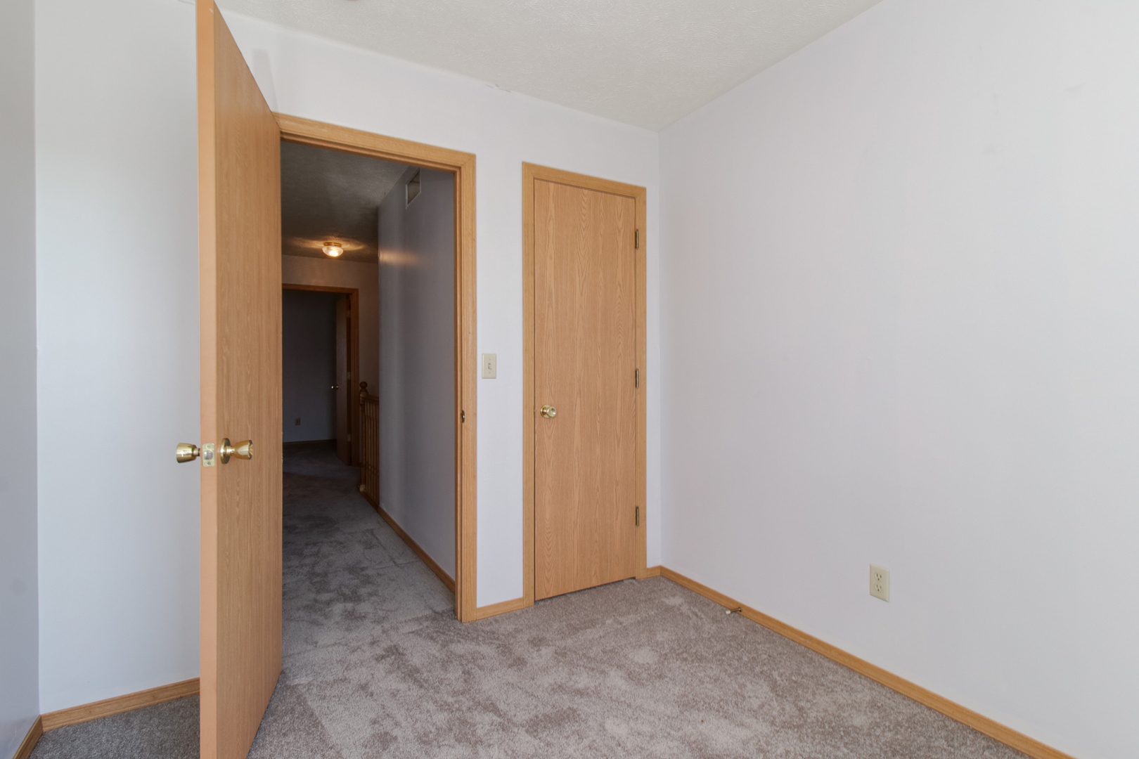 2 Andy Court, Unit 3 Bloomington, IL 61704 - Photo 19 of 28 a view of an empty room with closet and a bathroom