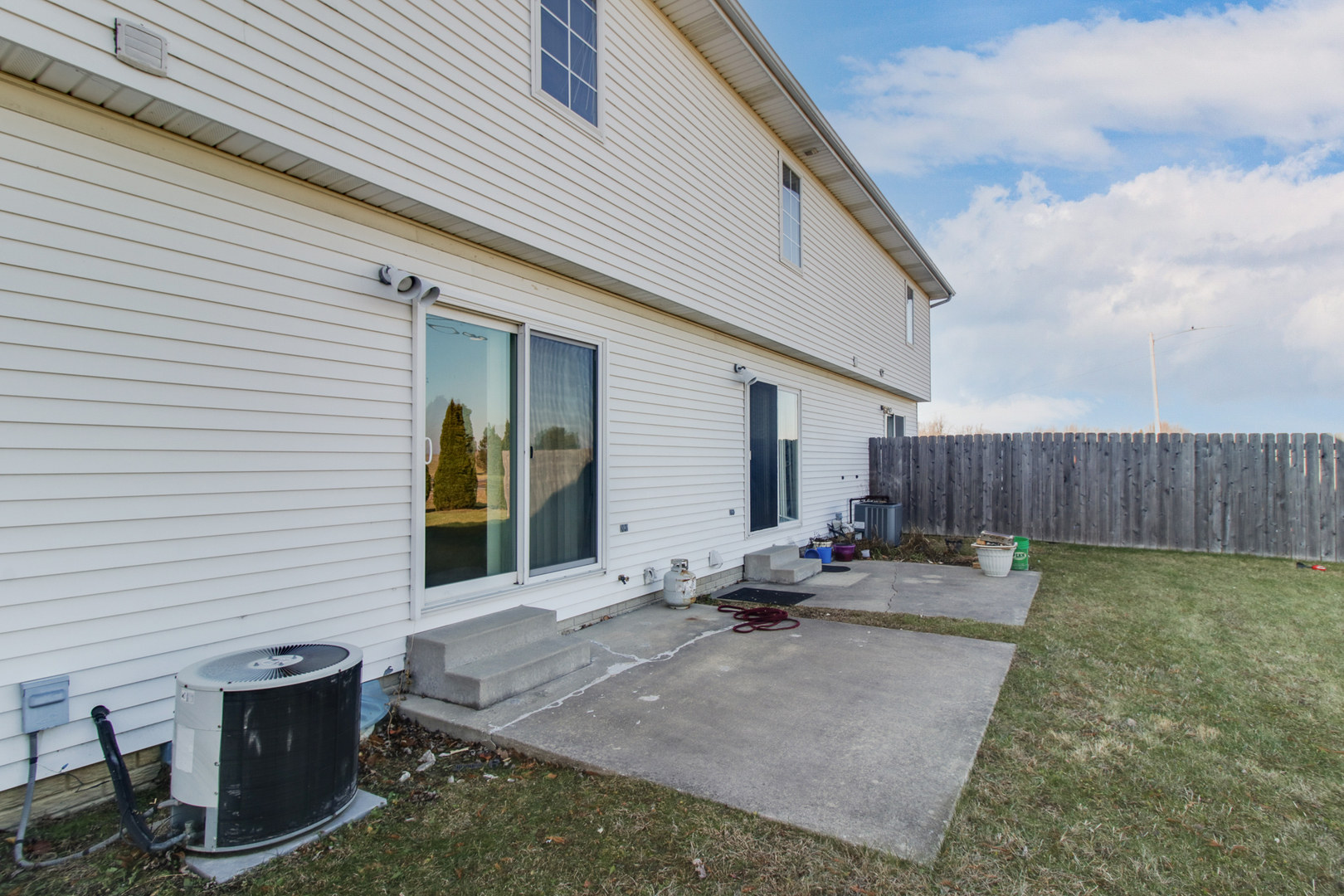 2 Andy Court, Unit 3 Bloomington, IL 61704 - Photo 25 of 28 a backyard of a house with seating space