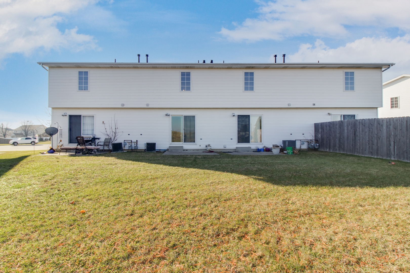 2 Andy Court, Unit 3 Bloomington, IL 61704 - Photo 26 of 28 a swimming pool view with plants and large trees