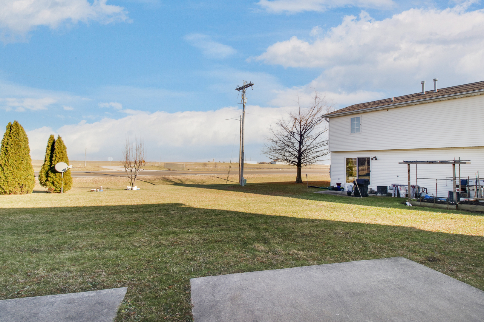 2 Andy Court, Unit 3 Bloomington, IL 61704 - Photo 27 of 28 a view of a swimming pool with an outdoor seating