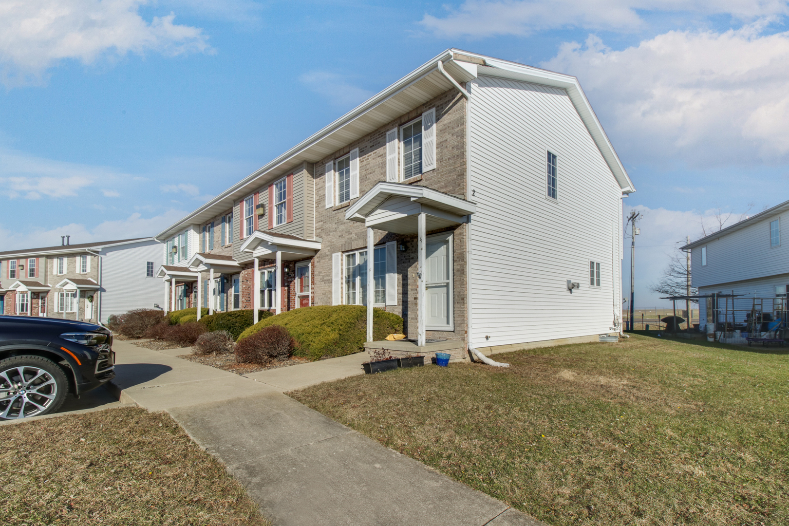 2 Andy Court, Unit 3 Bloomington, IL 61704 - Photo 28 of 28 a front view of a house with a yard