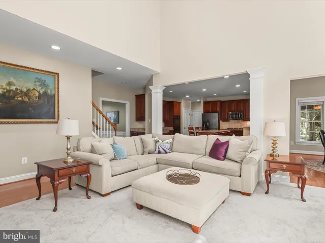 a bathroom with a sink mirror and toilet