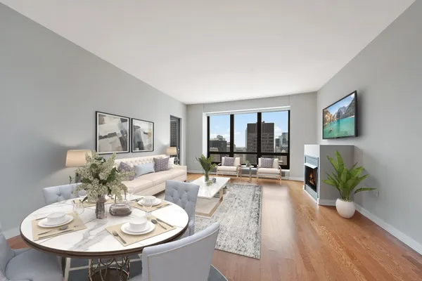 a living room with furniture and a table