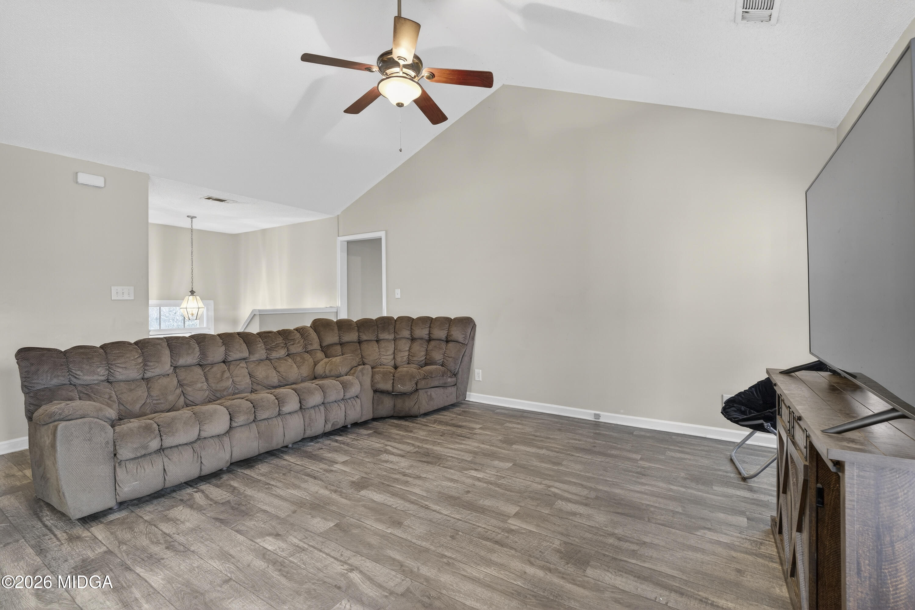 226 Amy Lane Gray, GA 31032 - Photo 13 of 46 a living room with furniture and a ceiling fan