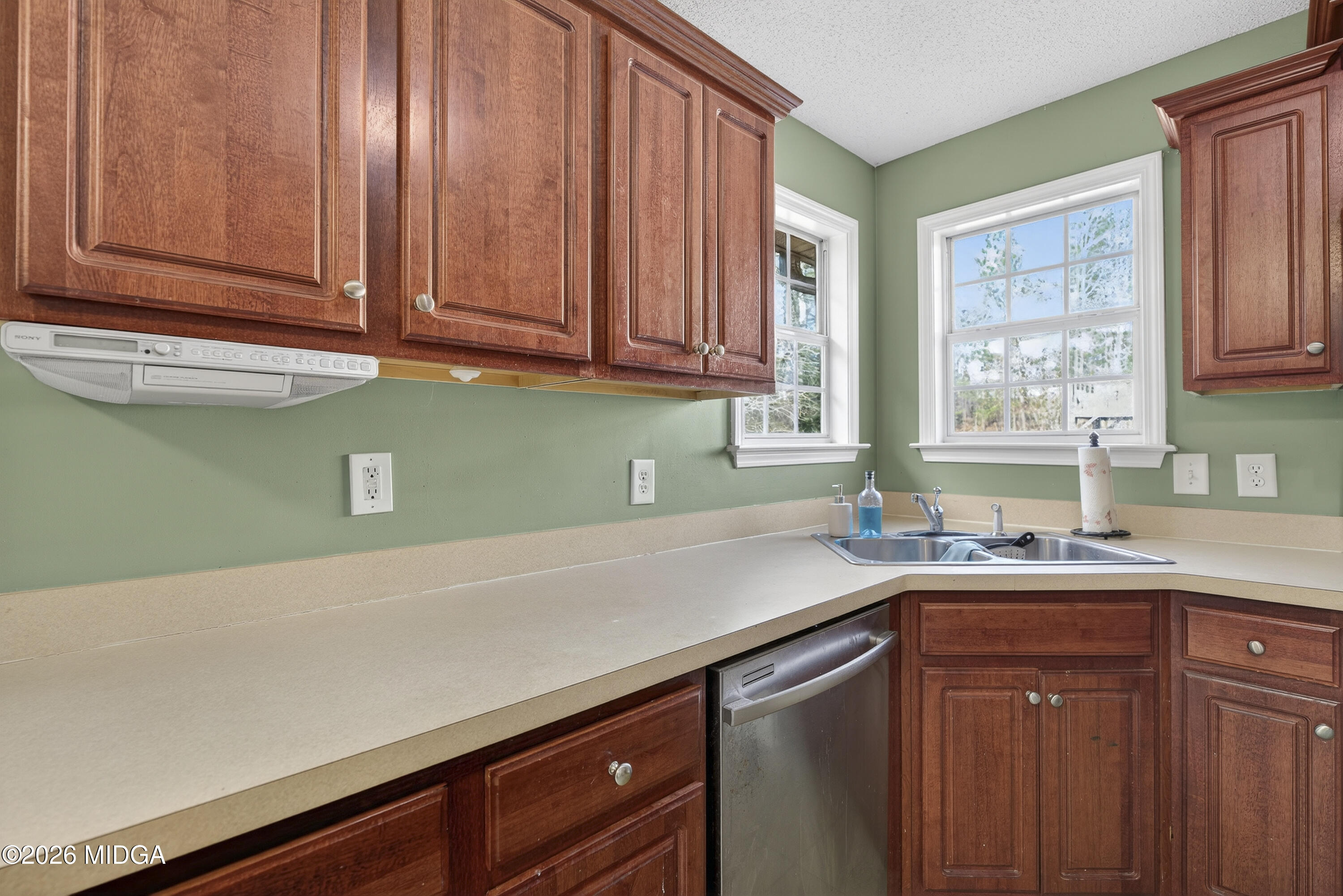 226 Amy Lane Gray, GA 31032 - Photo 17 of 46 a kitchen with a sink cabinets and window