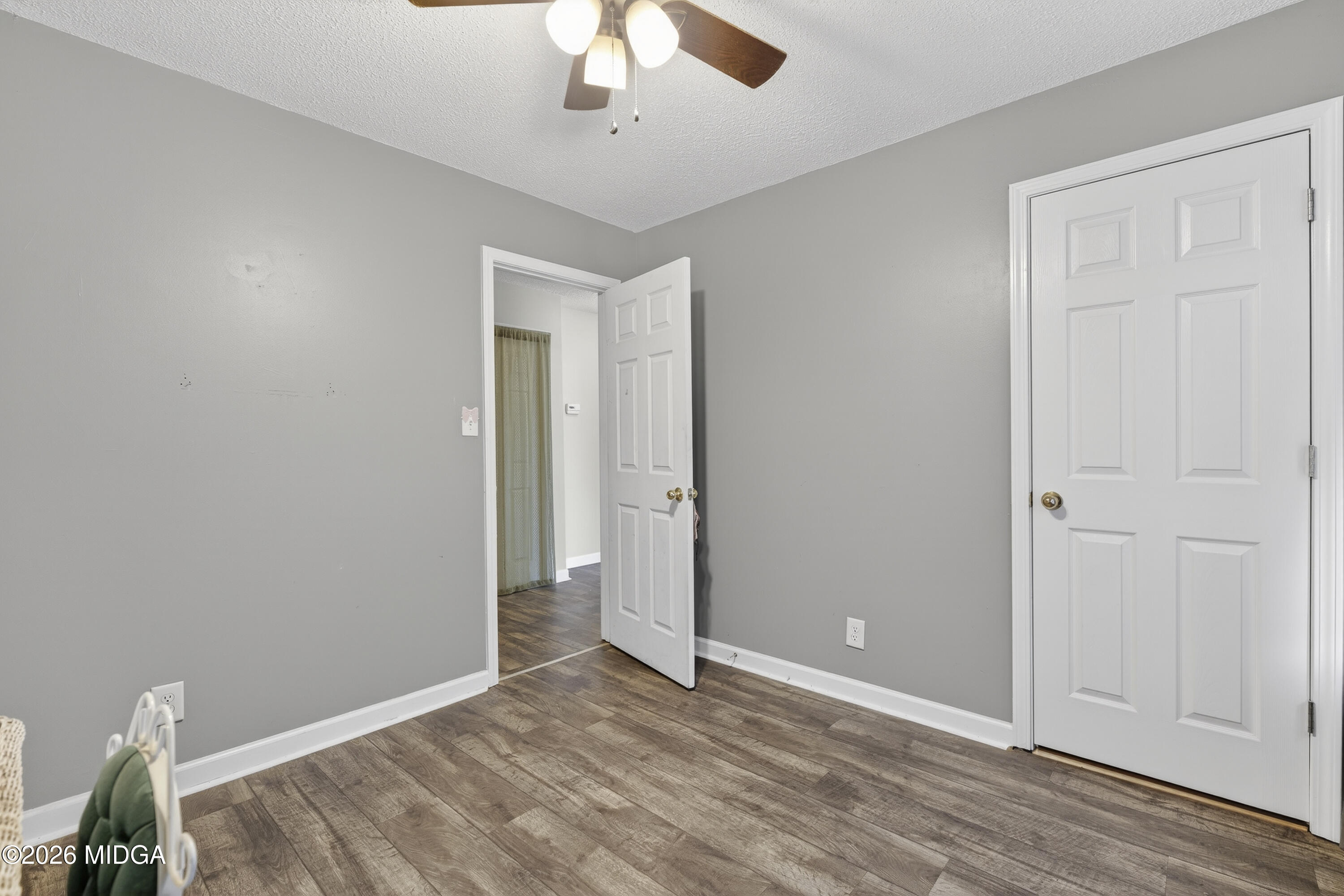 226 Amy Lane Gray, GA 31032 - Photo 22 of 46 an empty room with a empty space and chandelier fan
