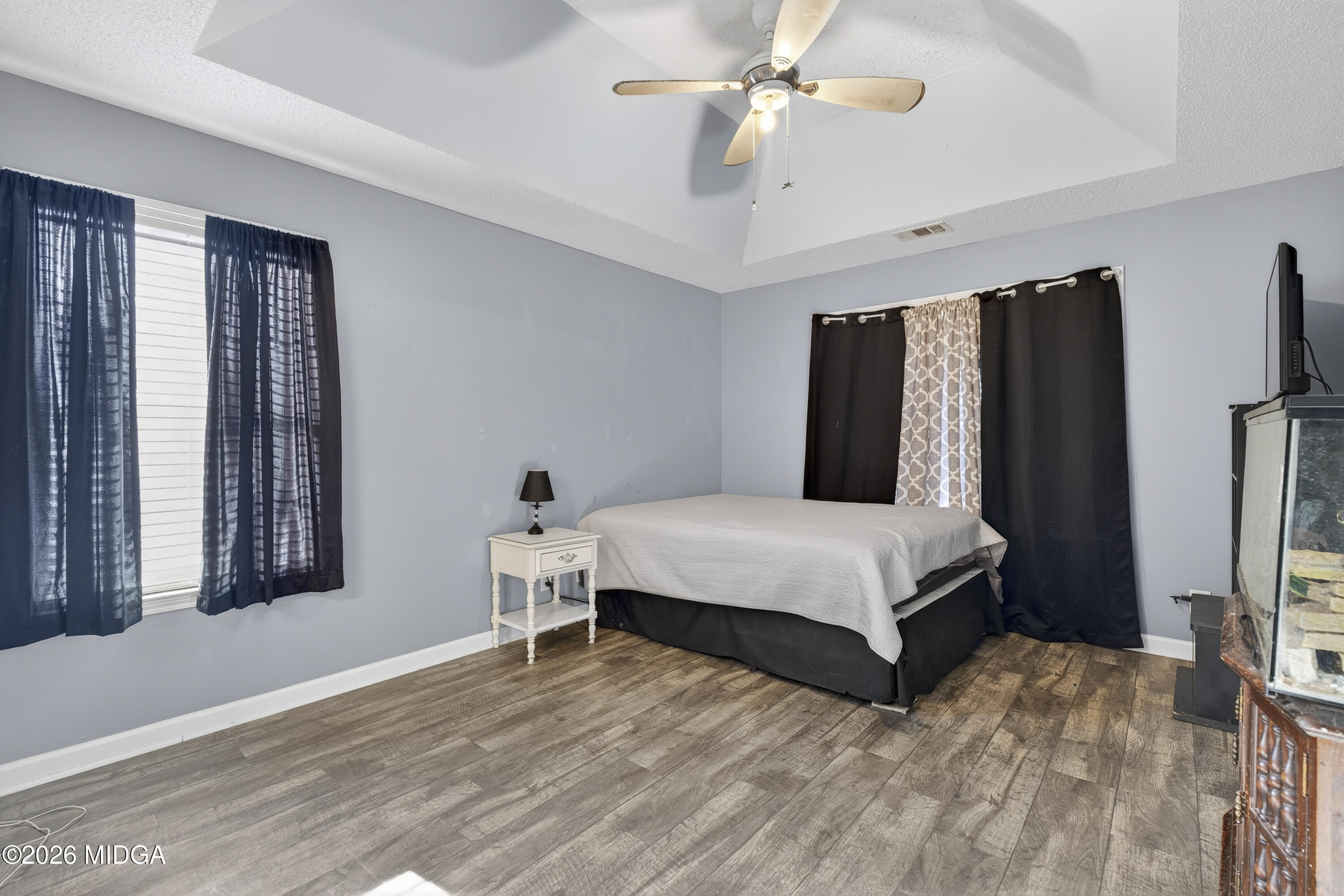 226 Amy Lane Gray, GA 31032 - Photo 26 of 46 a bedroom with a bed lamps and a large mirror