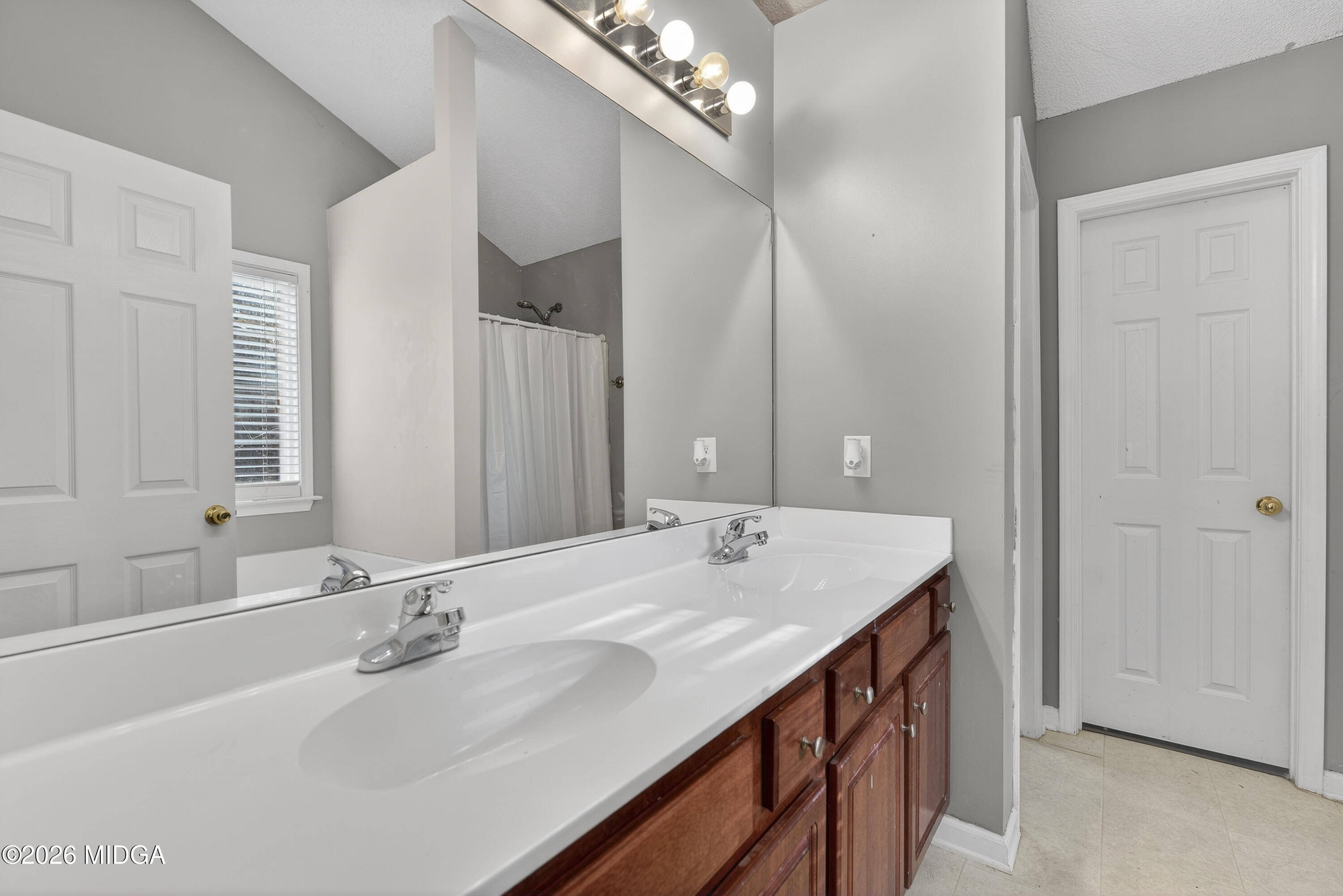 226 Amy Lane Gray, GA 31032 - Photo 29 of 46 a bathroom with a sink double vanity and a mirror