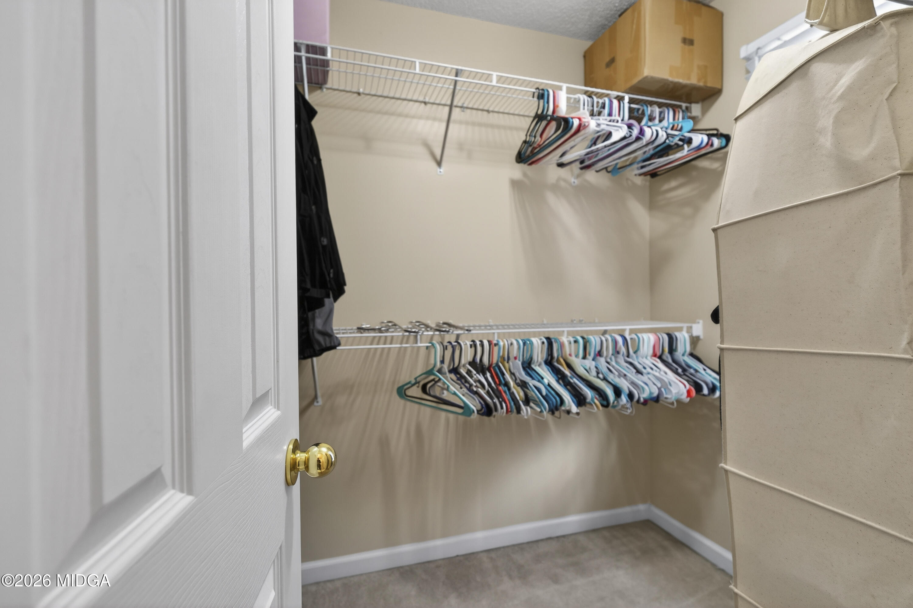 226 Amy Lane Gray, GA 31032 - Photo 32 of 46 a view of walk in closet with clothes and shoes