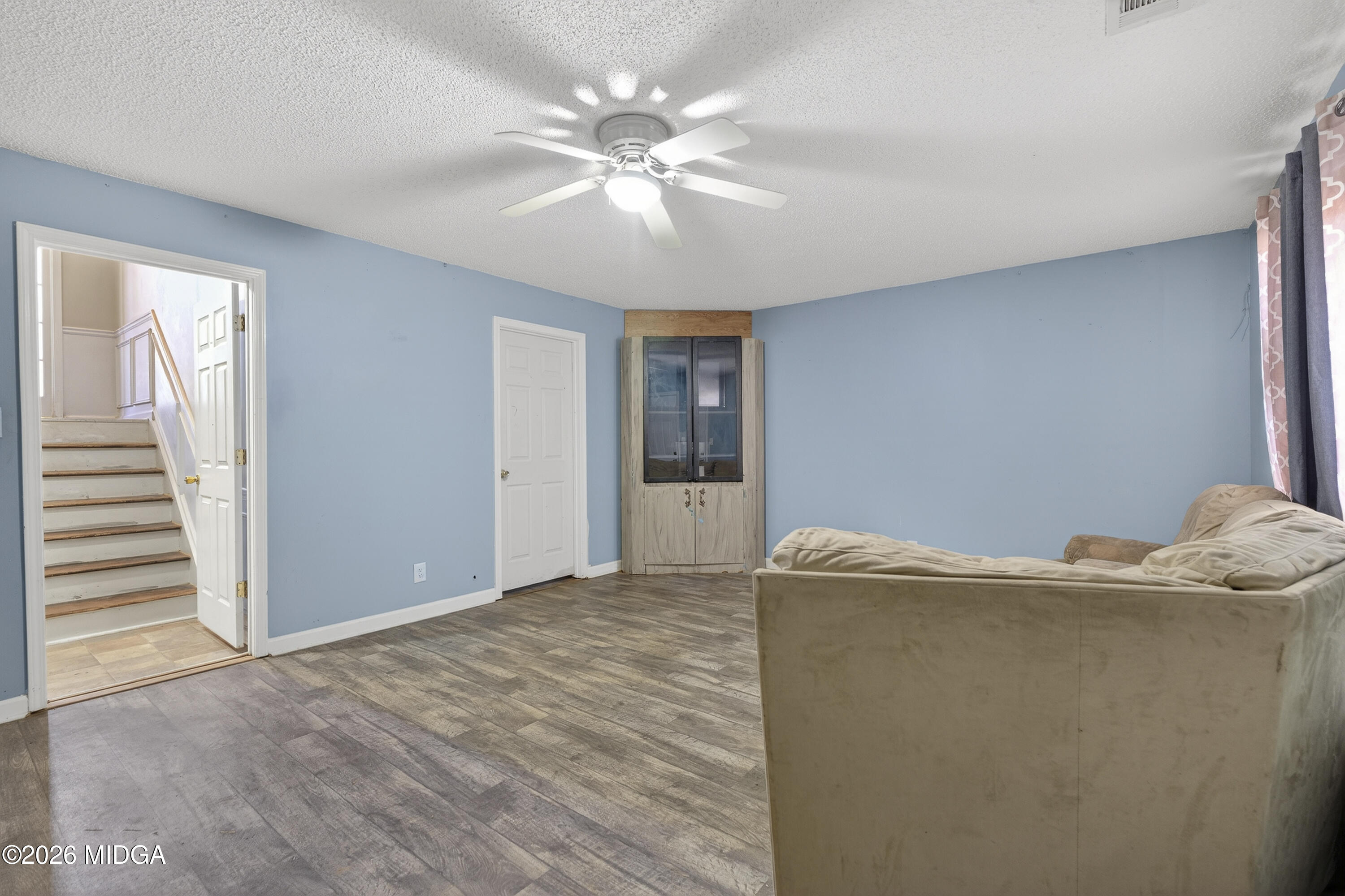 226 Amy Lane Gray, GA 31032 - Photo 34 of 46 an empty room with windows and fan