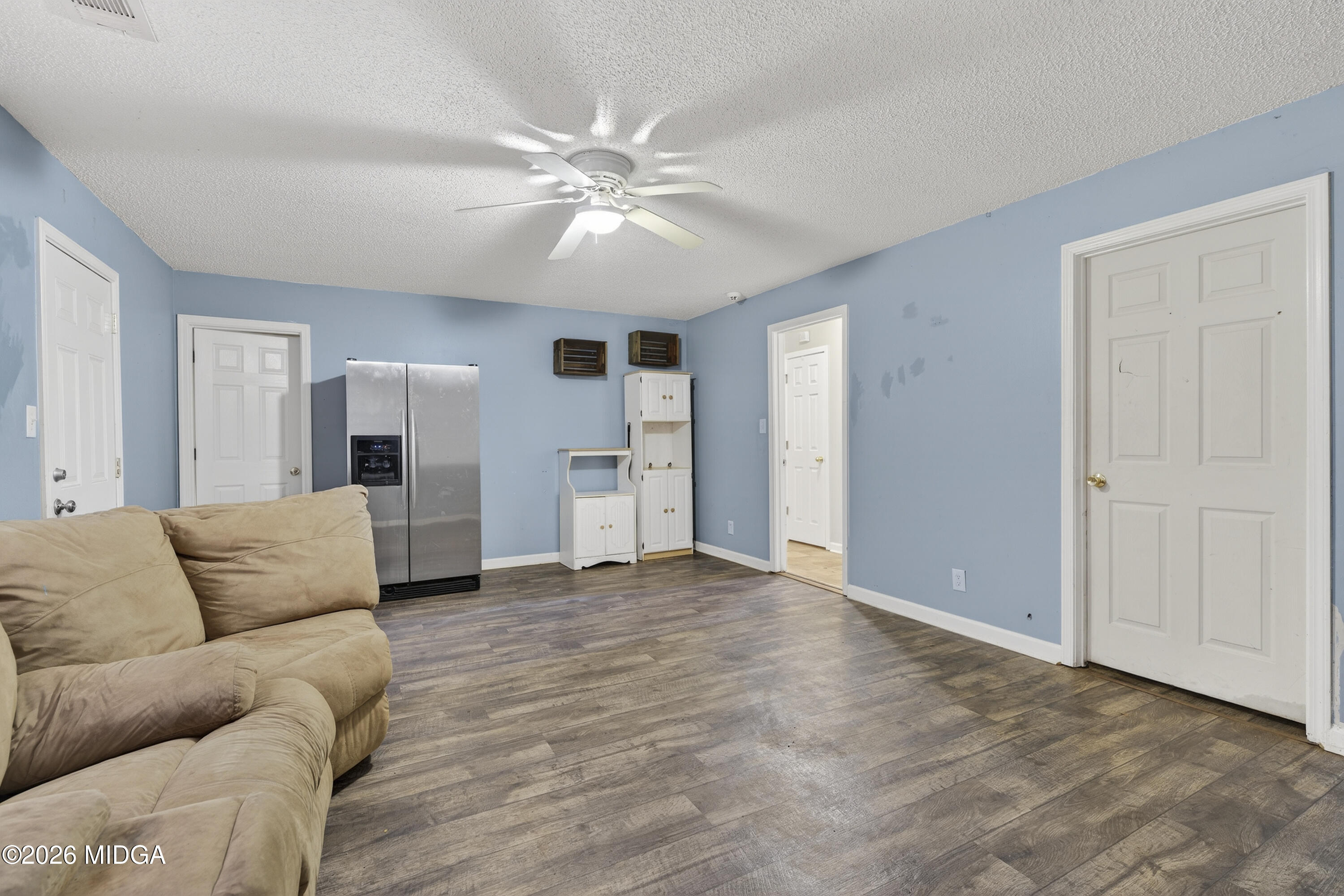226 Amy Lane Gray, GA 31032 - Photo 35 of 46 a living room with furniture and a chandelier