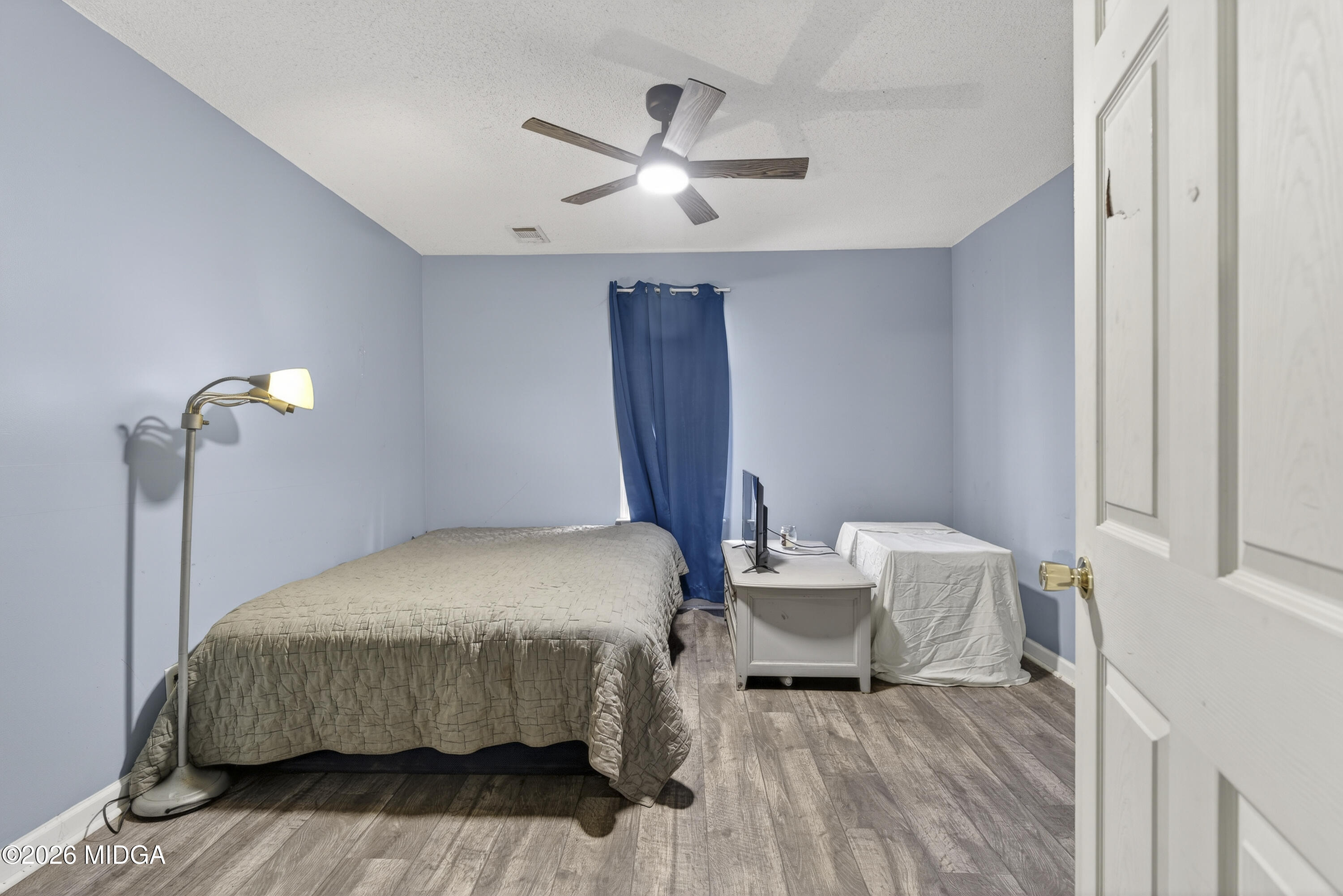 226 Amy Lane Gray, GA 31032 - Photo 36 of 46 a bedroom with a bed and a table