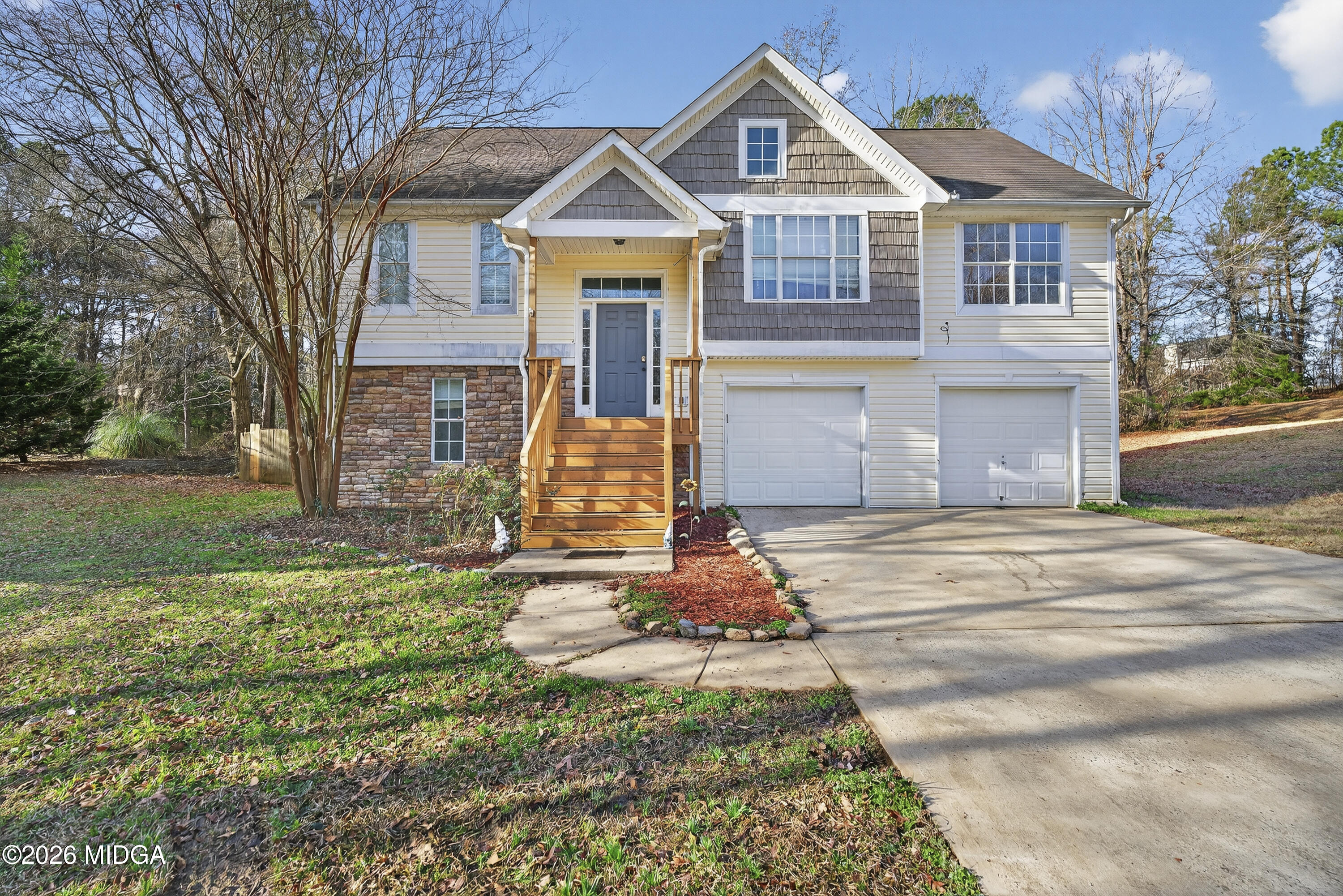 226 Amy Lane Gray, GA 31032 - Photo 4 of 46 a front view of a house with a yard