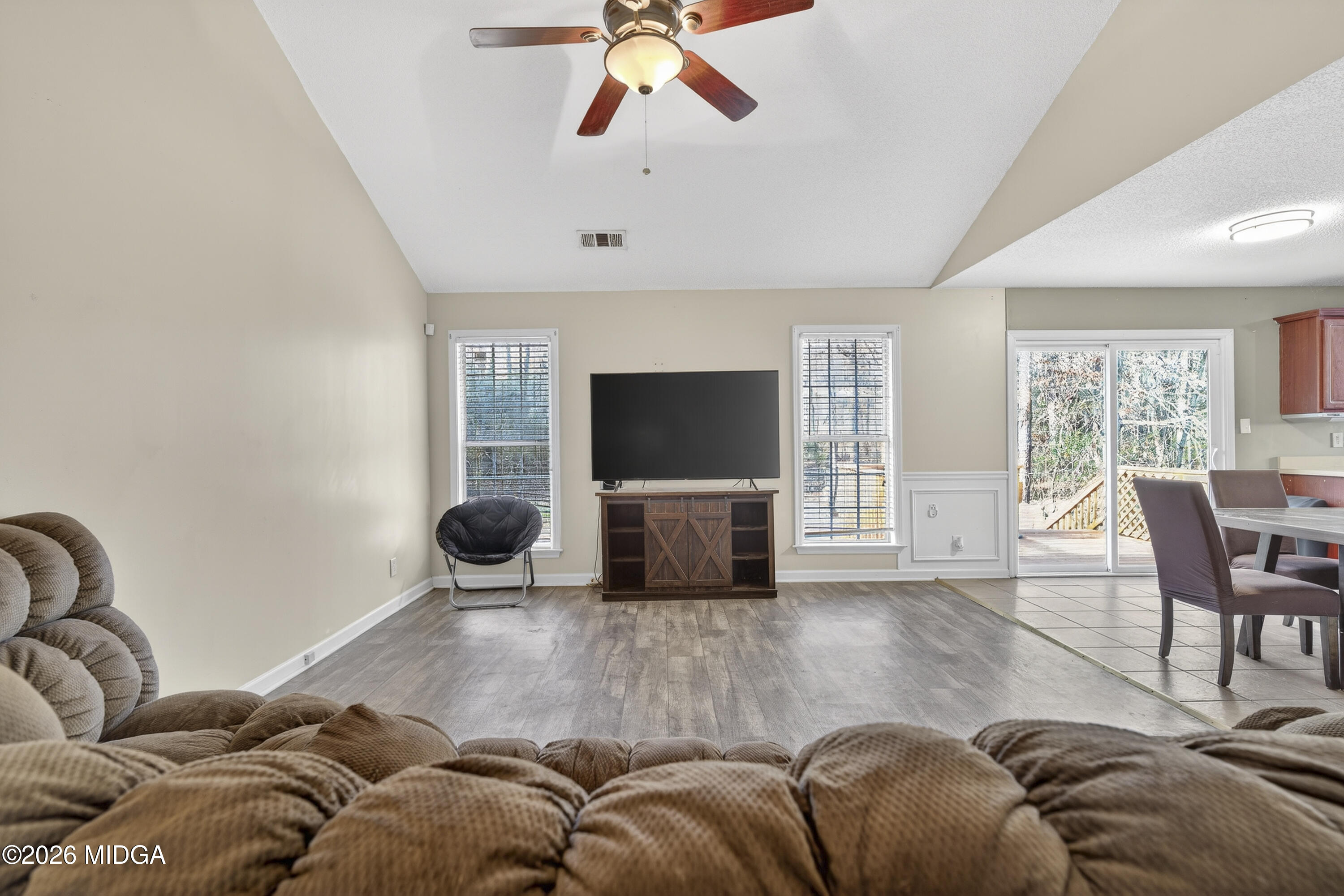 226 Amy Lane Gray, GA 31032 - Photo 8 of 46 a living room with furniture and a flat screen tv