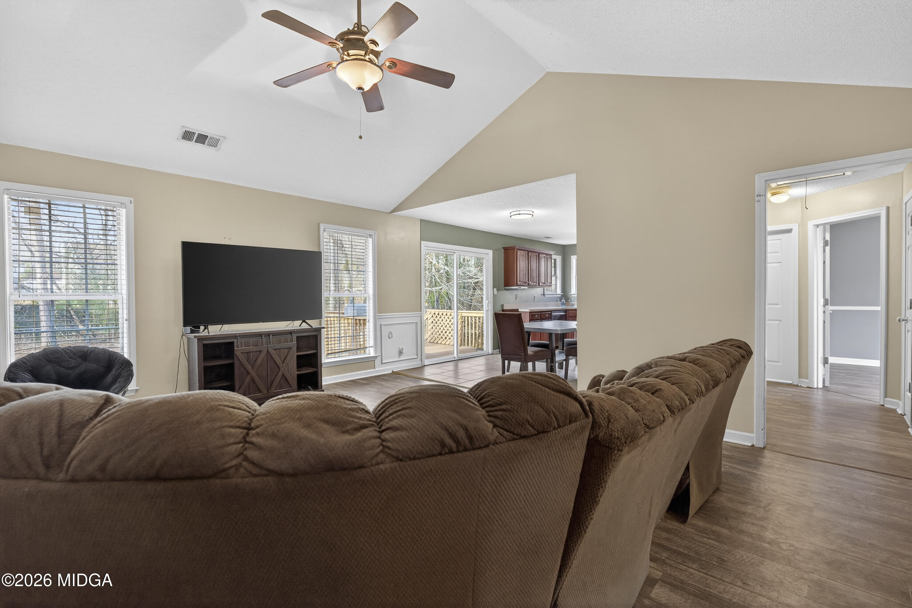 226 Amy Lane Gray, GA 31032 - Photo 9 of 46 a living room with furniture and a flat screen tv