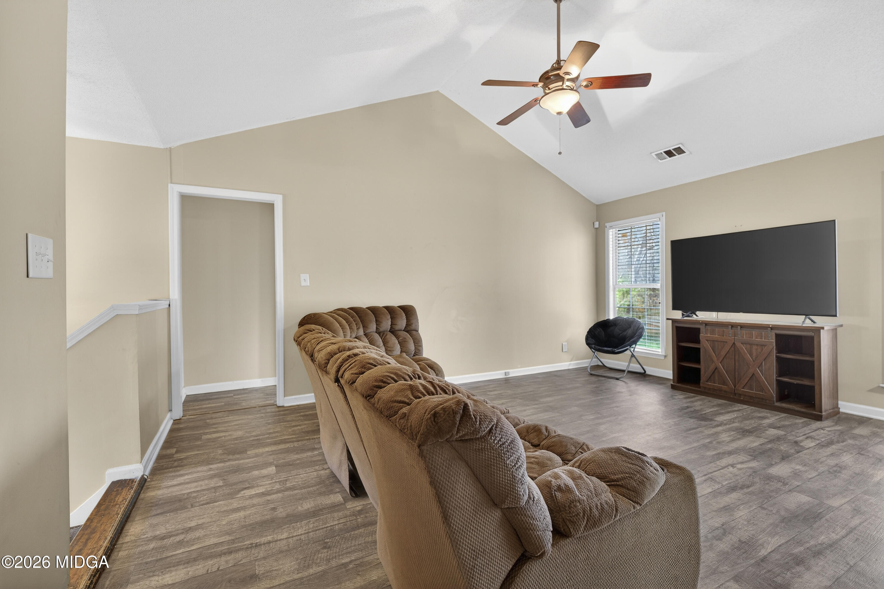 226 Amy Lane Gray, GA 31032 - Photo 10 of 46 a living room with furniture and a flat screen tv