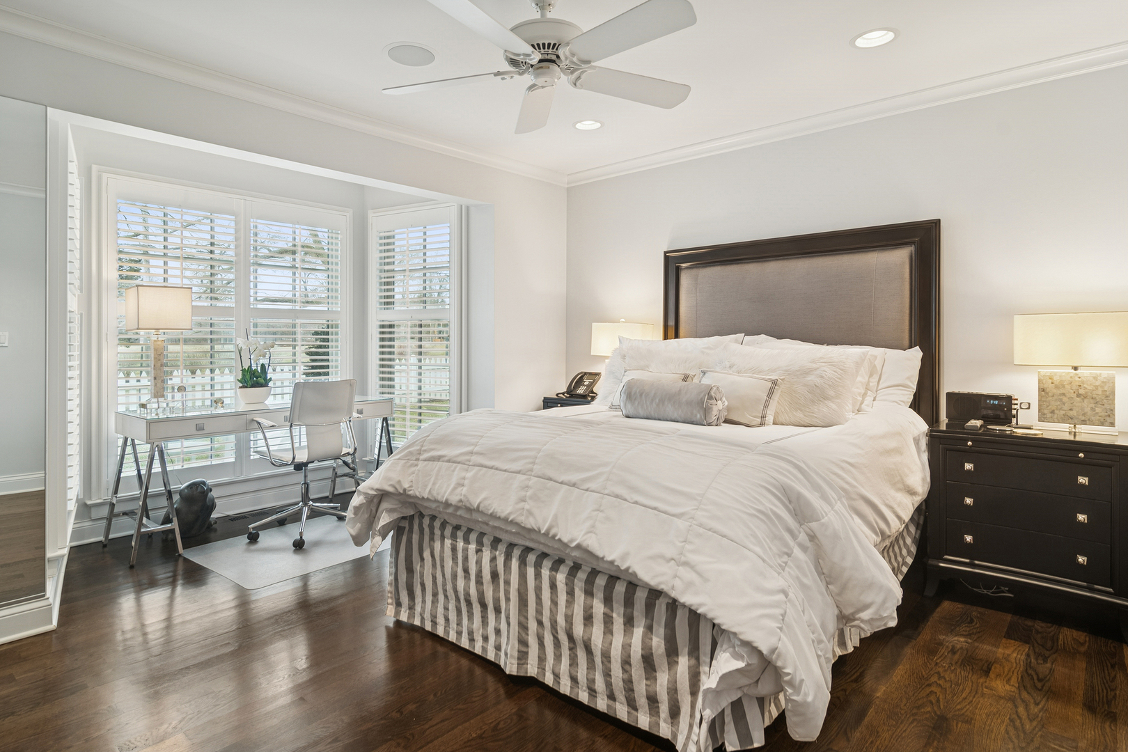 135 South Maywood Road Lake Forest, IL 60045 - Photo 14 of 35 a bedroom with a bed and a large window