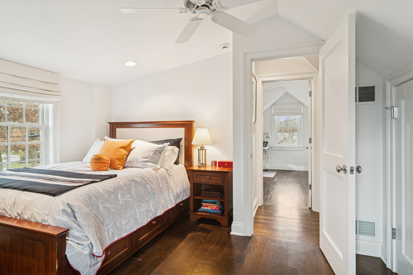 135 South Maywood Road Lake Forest, IL 60045 - Photo 26 of 35 a bedroom with a bed and a chandelier