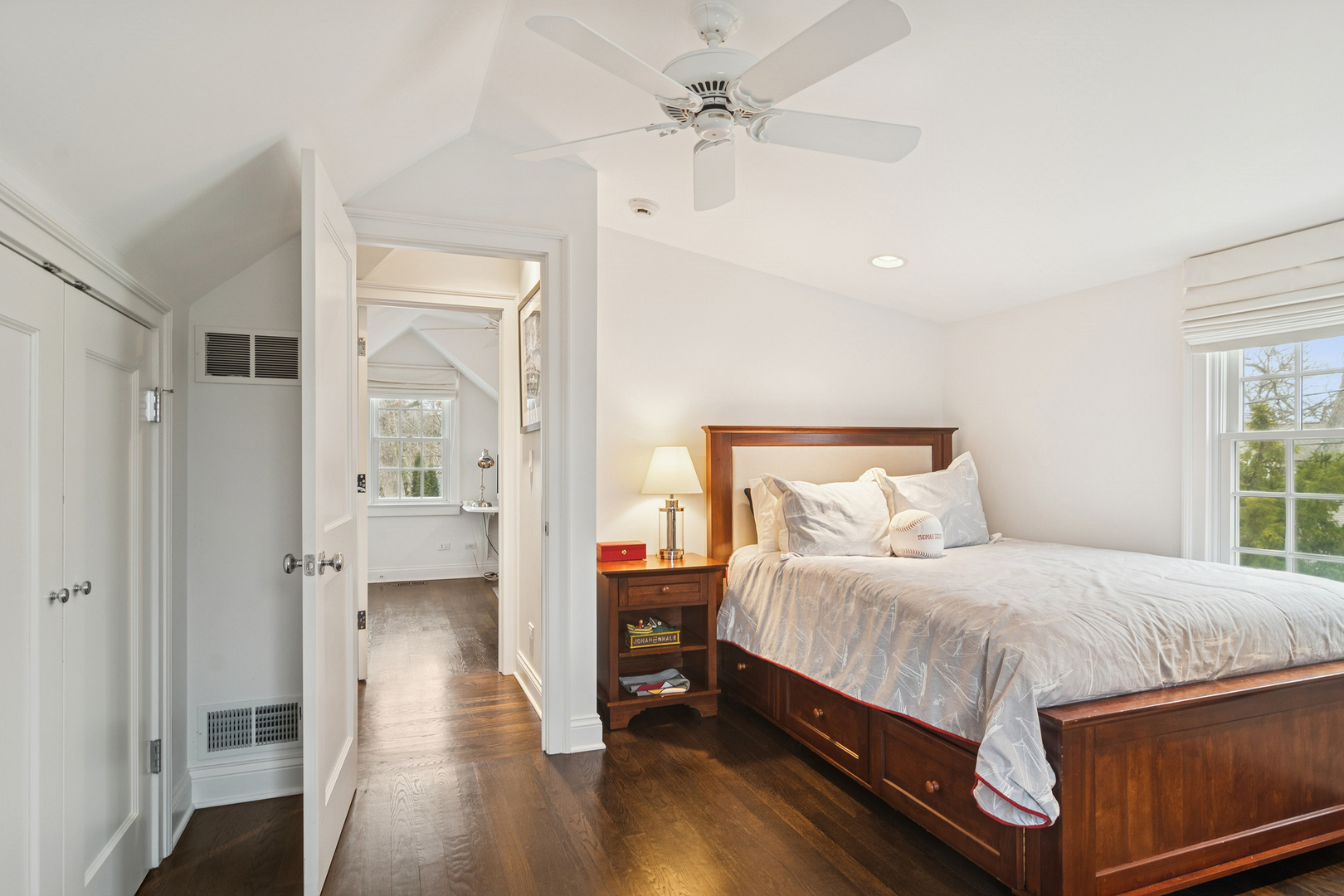 135 South Maywood Road Lake Forest, IL 60045 - Photo 28 of 35 a bedroom with a bed and a view of bathroom