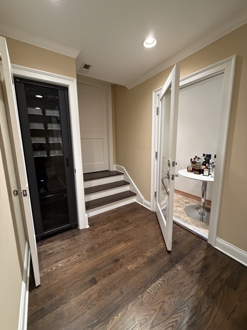 135 South Maywood Road Lake Forest, IL 60045 - Photo 30 of 35 a view of entryway with wooden floor and stairs