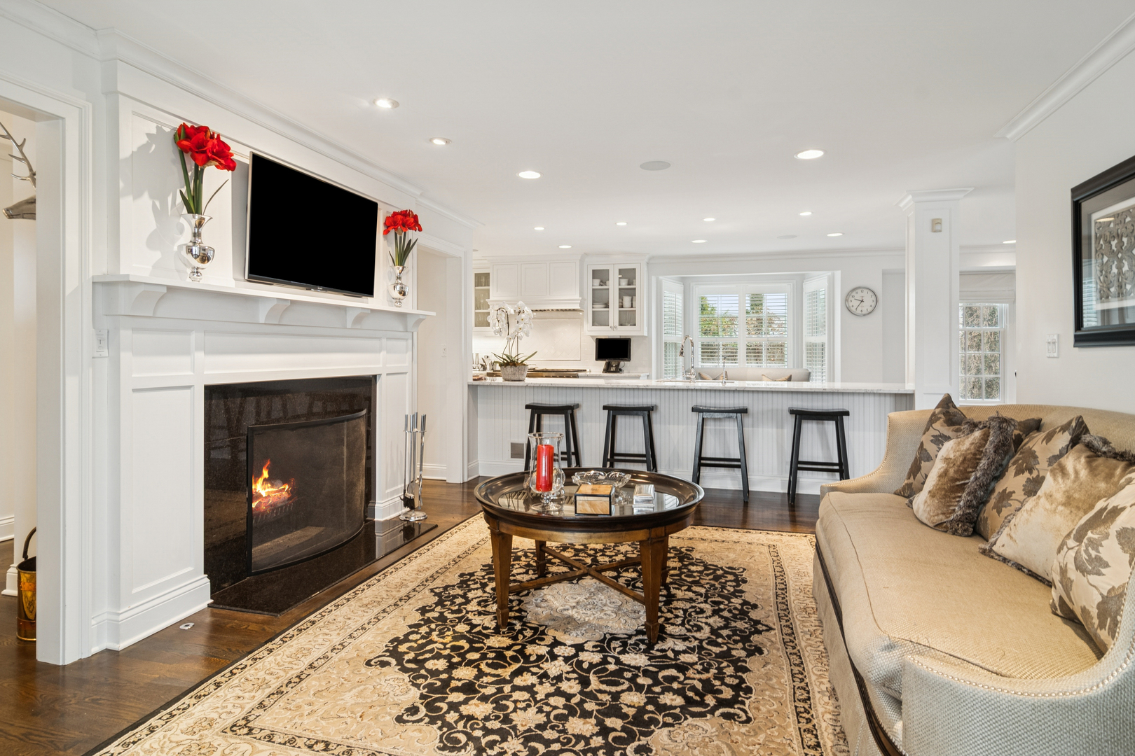 135 South Maywood Road Lake Forest, IL 60045 - Photo 6 of 35 a living room with furniture a flat screen tv and a fireplace