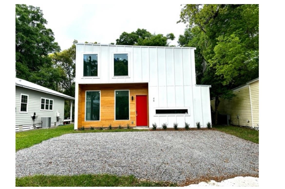 48 Phillips Street St. Augustine, FL 32084 - Photo 1 of 1 a view of a house with a backyard