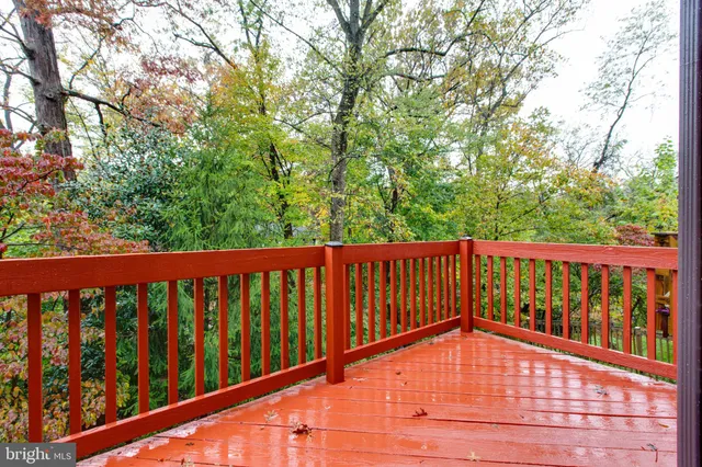 a view of balcony with wooden floor