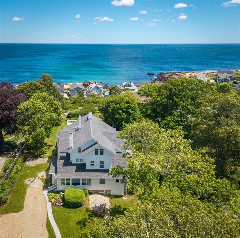 15 Brier Road Gloucester, MA 01930 - Photo 1 of 38 a aerial view of a house with a ocean view