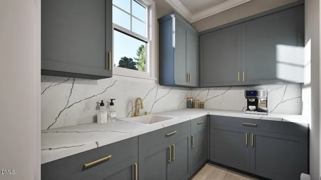 a kitchen with a sink and cabinets