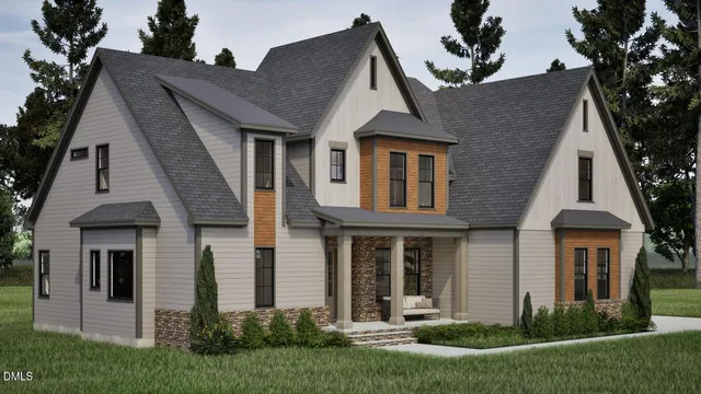 a front view of a house with a yard and trees