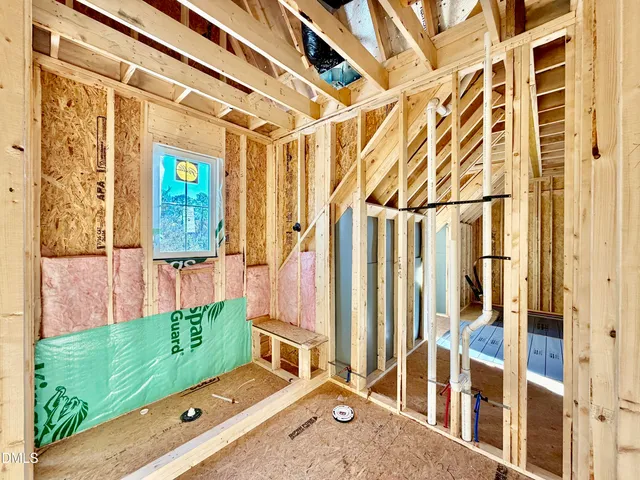 a view of an entryway with a front door