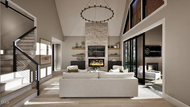 a living room with fireplace furniture and a large window