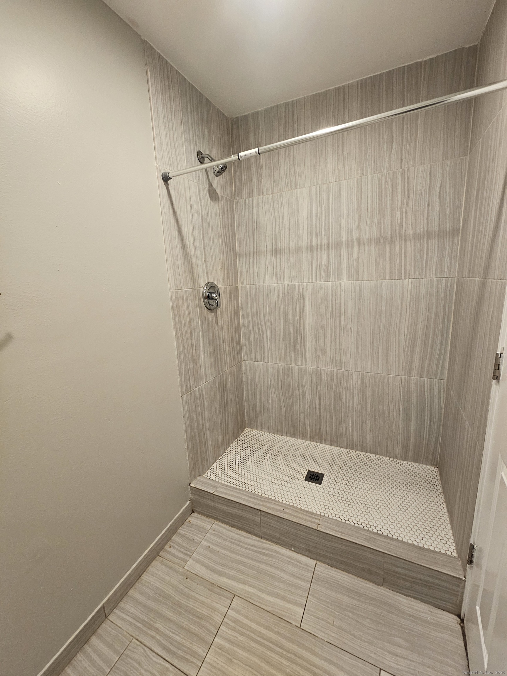 370 Bruce Avenue Stratford, CT 06615 - Photo 5 of 6 a bathroom with a shower and a toilet